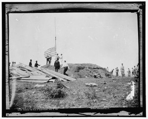 Hoisting the flag at Guantanamo, June 12, 1898