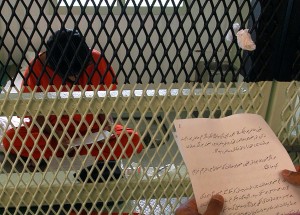 Guantanamo Bay, Cuba - The Combatant Status Review Tribunal Notice is read to a detainee. Photo by Airman Randall Damm, USN