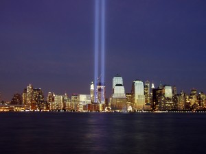 Two beams of light represent the former Twin Towers of the World Trade Center during the 2004 memorial of the September 11, 2001 attacks. Photo by Derek Jensen